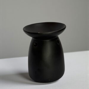 Difusor cerámico negro premium con diseño calado para wax melts y aromaterapia