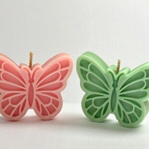 Vela mariposa souvenir artesanal con envoltura de tul para baby shower y bautizos